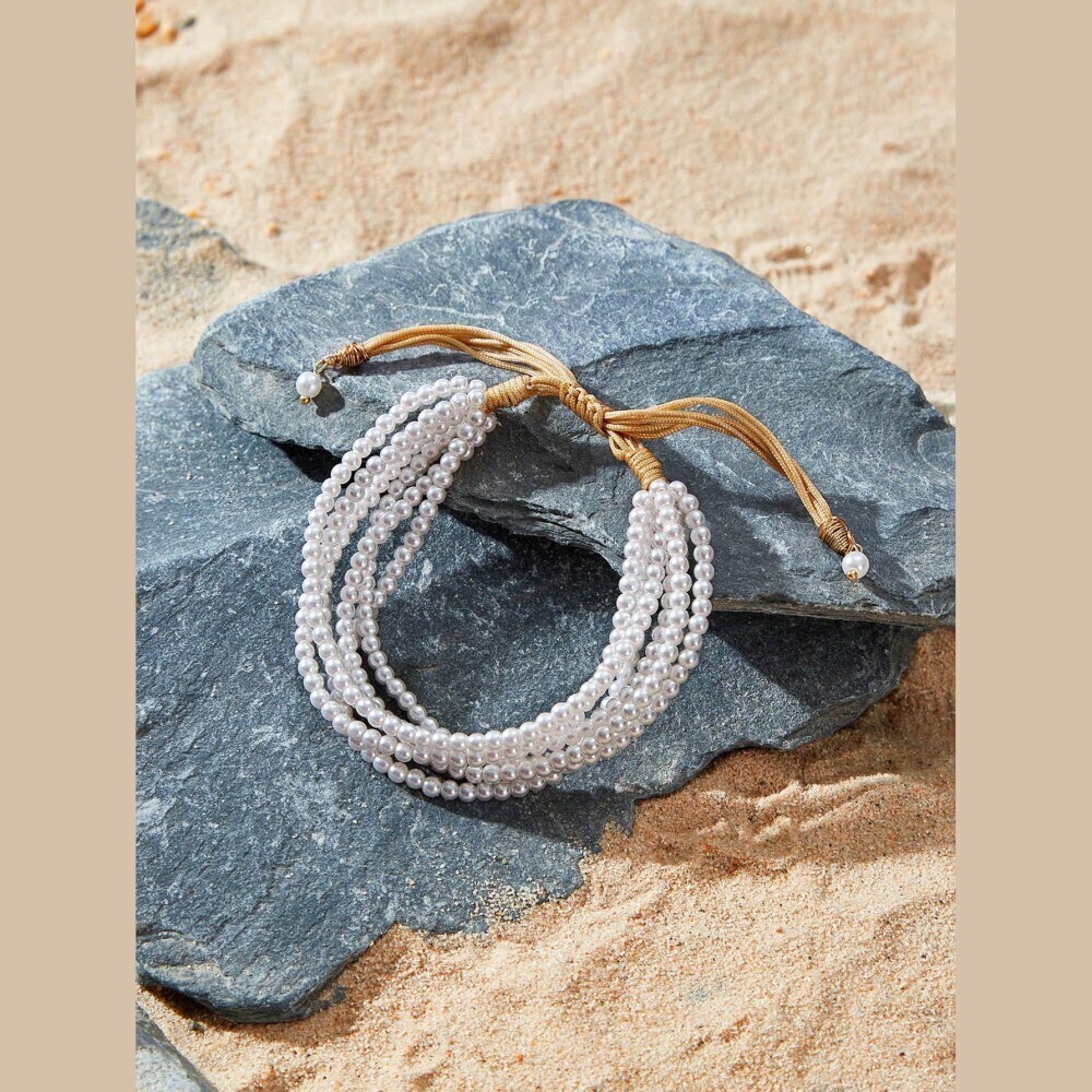 Ivory Faux Pearl Multi-Strand Beaded Bracelet with Gold Cord Tie